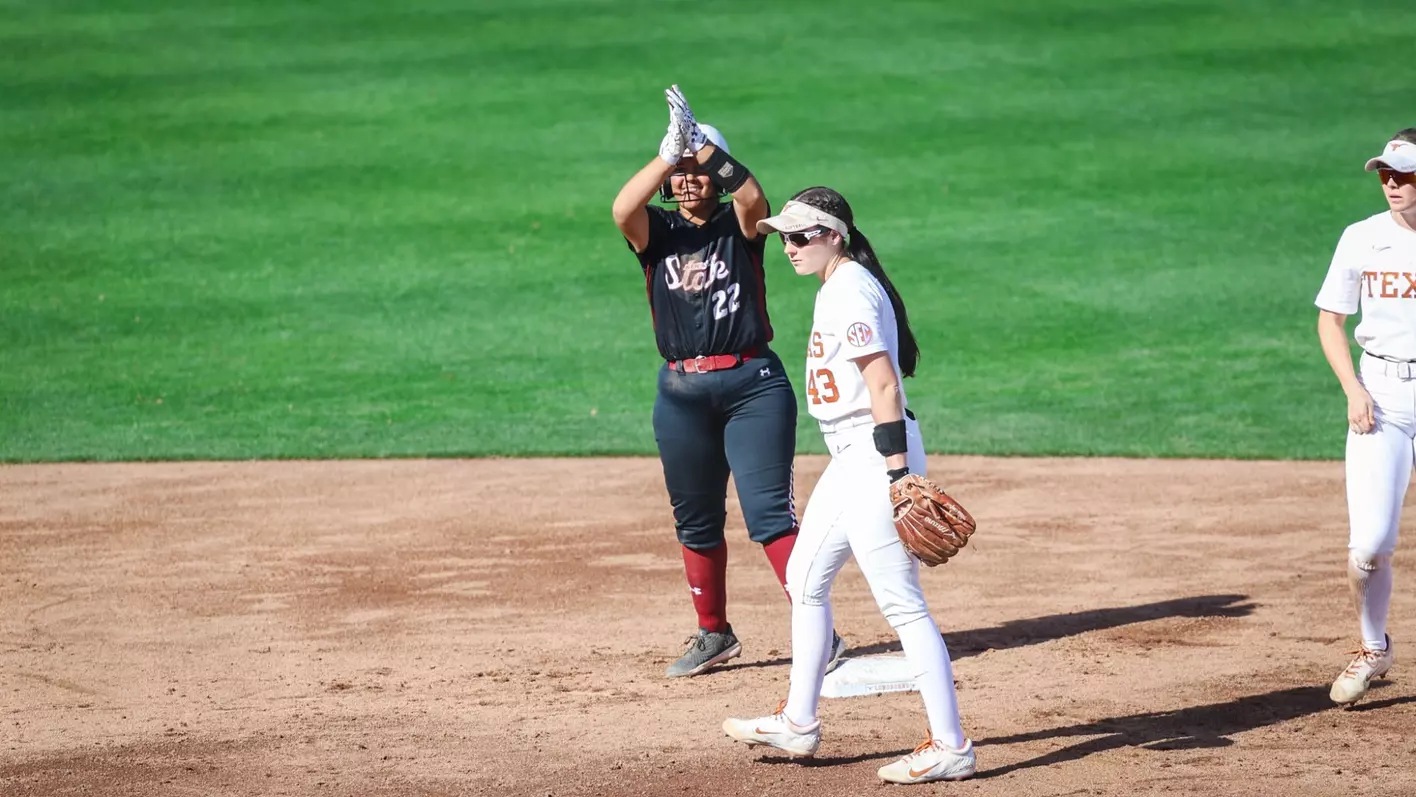 TIGHT BATTLE WITH TOP-RANKED LONGHORNS CAPS OFF SATURDAY SPLIT